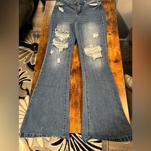 Ripped bootcut jeans size medium. Tall